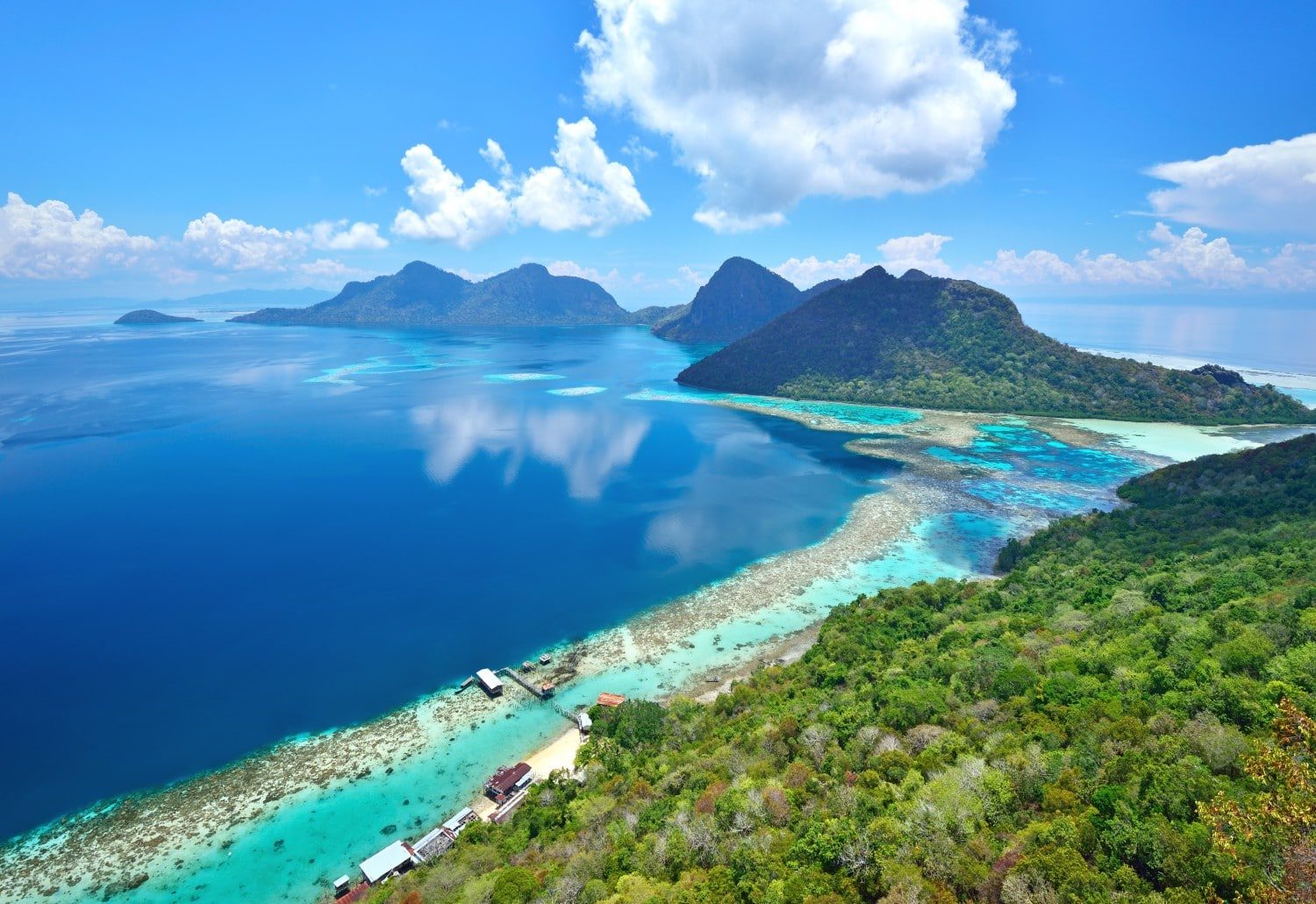 Aerial view of tropical island of Bohey Dulang near Siapdan Island, Sabah Borneo, Malaysia.