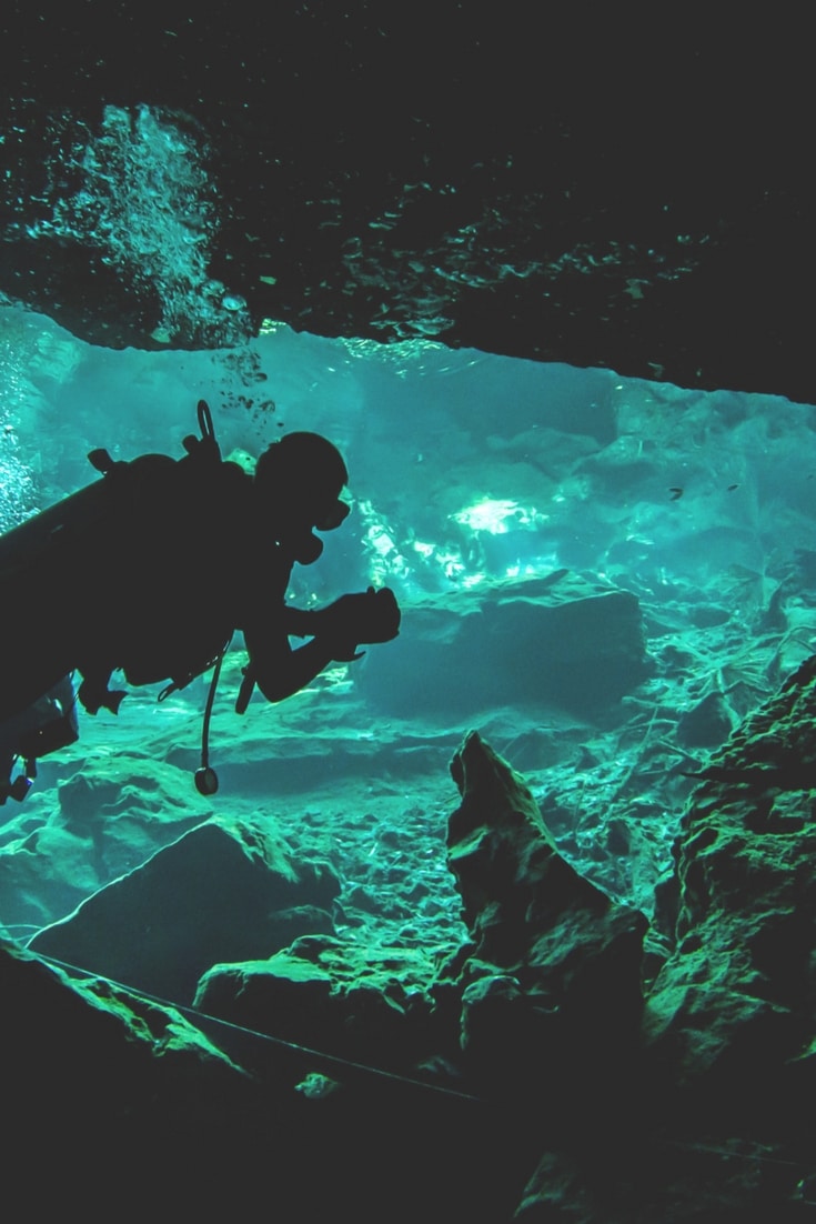 Have you ever tried cenote diving in Mexico? It's one of the 15 amazing travel adventures that really must go on your bucket list. Click to read the full list and see how many you've tried.