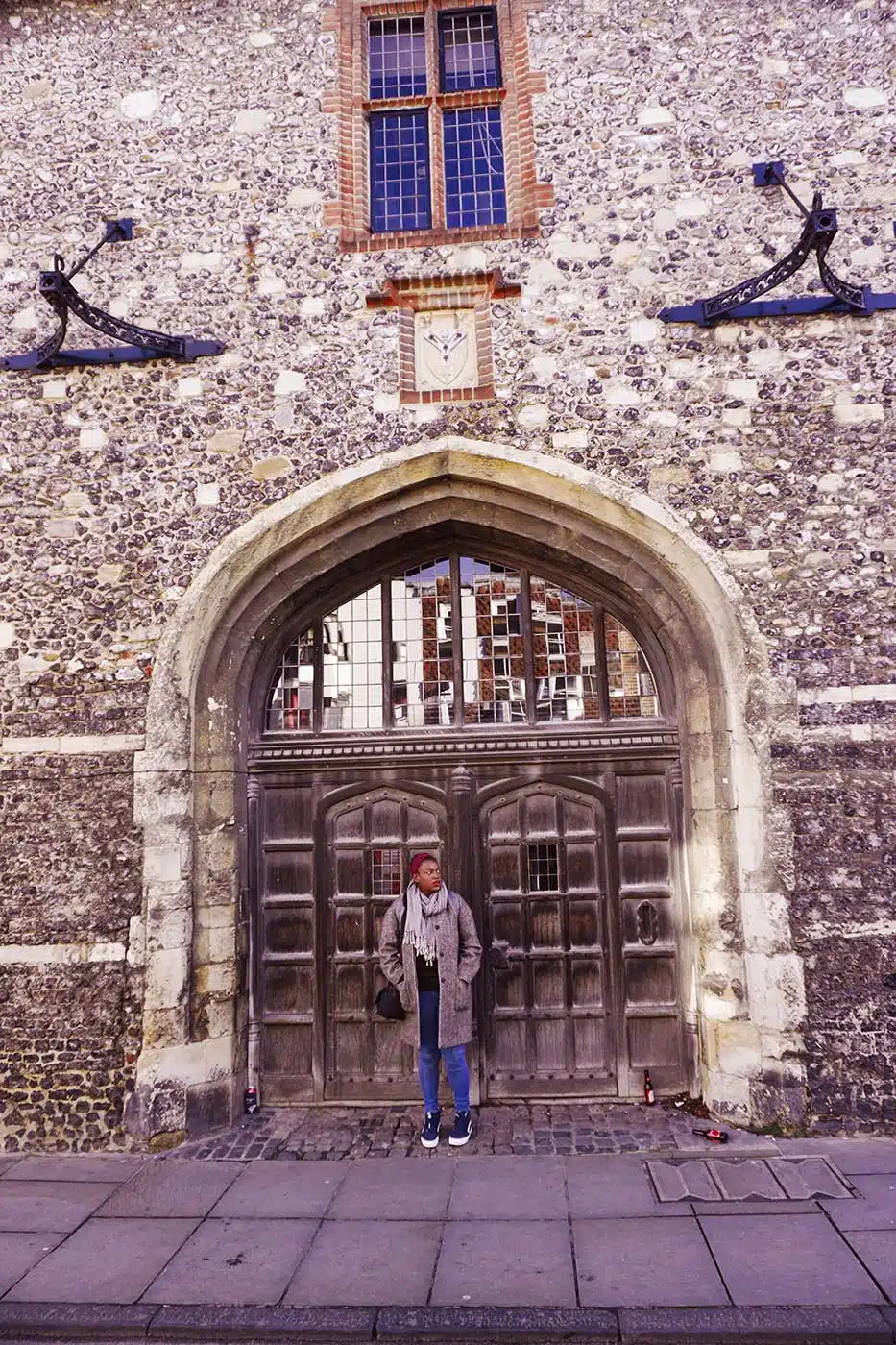 Julianna Barnaby and Medieval gate in Canterbury