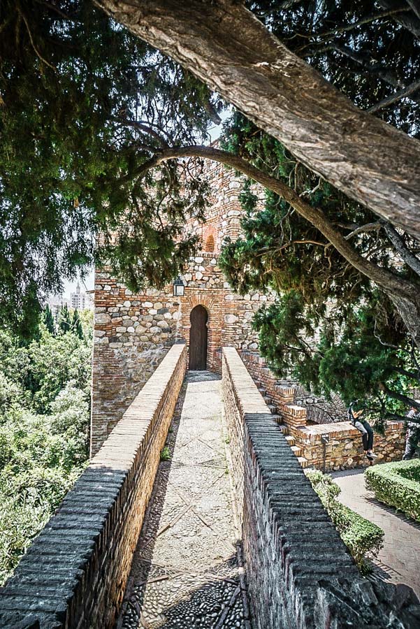 Walkway in the Alcazaba. Malaga, Spain might be best known as a beach destination, but visitor's shouldn't miss the gorgeous Alcazaba palace. Hands down the best thing to do during your travels to Malaga. Here's why... #spain #europe #traveltips