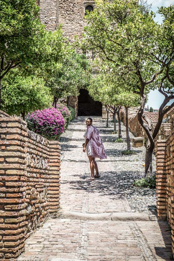 Checking out the Alcazaba. Malaga, Spain might be best known as a beach destination, but visitor's shouldn't miss the gorgeous Alcazaba palace. Hands down the best thing to do during your travels to Malaga. Here's why... #spain #europe #traveltips