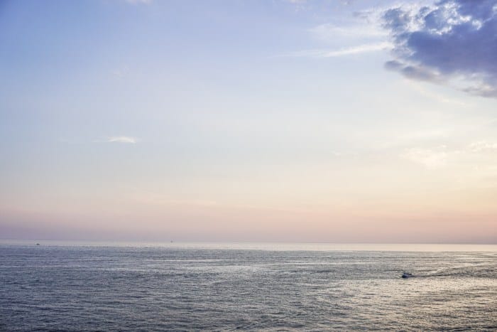 Dusk over the Adriatic - Buza Bar is one of Dubrovnik's coolest nightlife spots. This cliffside bar bosts beautiful views of the sea from a hidden spot in Dubrovnik Old Town. One of the top things to do in Dubrovnik! Read now #dubrovnik #travel #wanderlust 