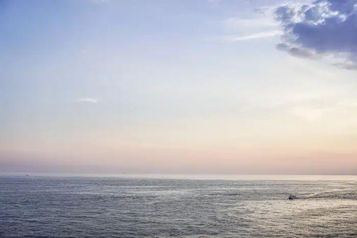 Dusk over the Adriatic - Buza Bar is one of Dubrovnik's coolest nightlife spots. This cliffside bar bosts beautiful views of the sea from a hidden spot in Dubrovnik Old Town. One of the top things to do in Dubrovnik! Read now #dubrovnik #travel #wanderlust