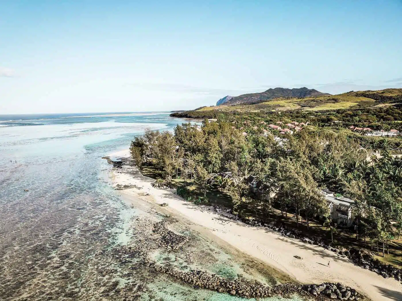 Luxury hotels in Mauritius don't come better than the five-star Outrigger Beach Resort. Luxury hotel suites and rooms on white sand beaches - escape to paradise. Read my full review #luxurytravel #travel #paradise