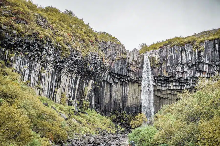 Svartifoss - black falls. 18 Iceland waterfalls that need to be seen to be believed. Photography hotspots, beautiful landscapes - don't miss them on your next trip. Complete with a map! #landscapes #photography #europe