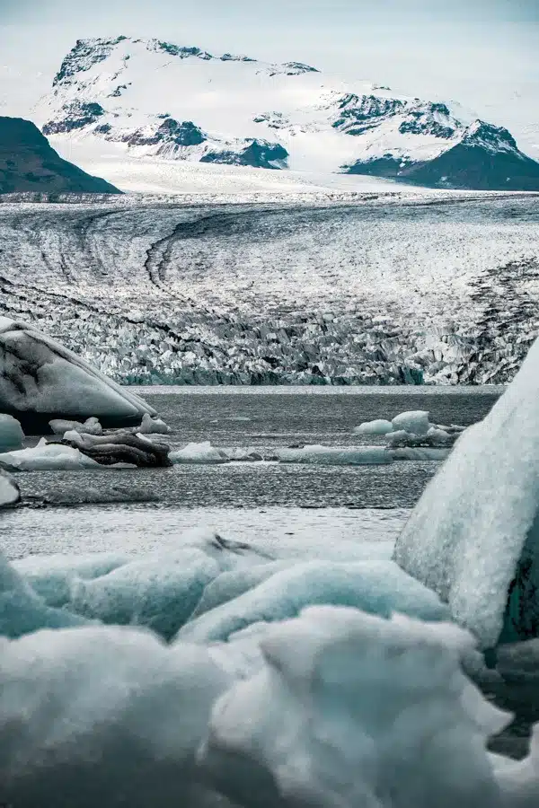 Jokulsarlon Glacier Lagoon in Iceland is simply incredible. A prime travel destination for seeing the Northern Lights and one of the most memorable Iceland landscapes - here's what you need to know before you go #iceland #travel #traveltips