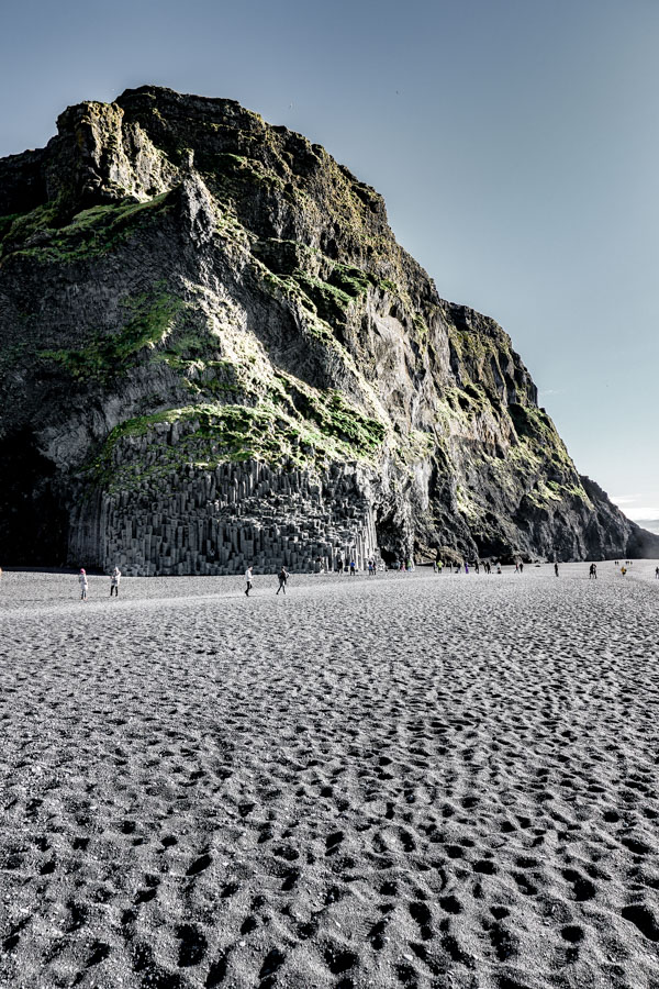 Reynisfyara and the Reynisdrangar Cliffs. Reynisfjara is the Iceland beach you HAVE to visit on your travels. A beautiful landscape in summer or winter. Here's how to plan your trip #travel #wanderlust #travelinspiration