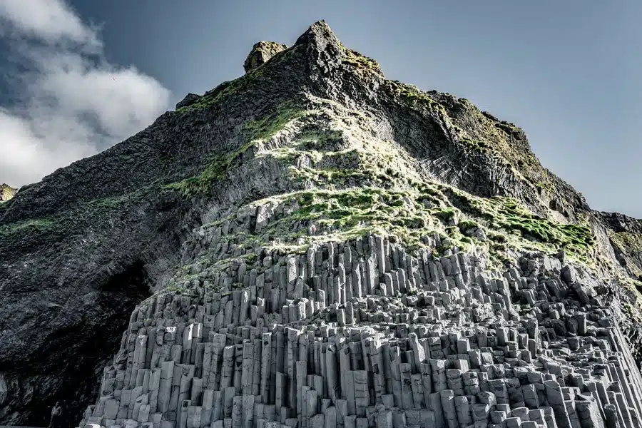 Basalt sea columns on Vik Beach, Iceland. Reynisfjara Beach in Vik is one of Iceland's most stunning destinations. A black sand beach framed by huge basalt columns... here's why you need to go. #travel #wanderlust #iceland  