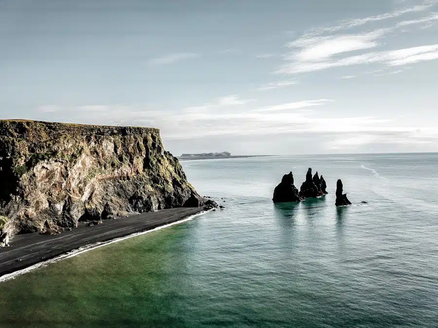 Reynisfjara is one of the Game of Thrones filming locations in Iceland. Iceland is packed with incredible landscapes and beautiful places. Reynisfjara in Vik is one of them - a black sand beach that proves nature is a drama queen! Pure photography inspiration. #travel #iceland #travelinspiration 