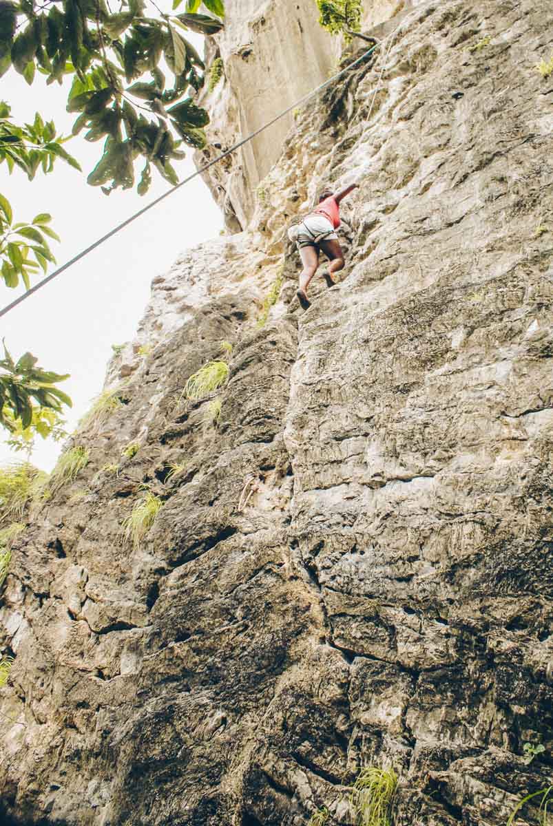 Julianna Barnaby scaling the cliffs at Railay