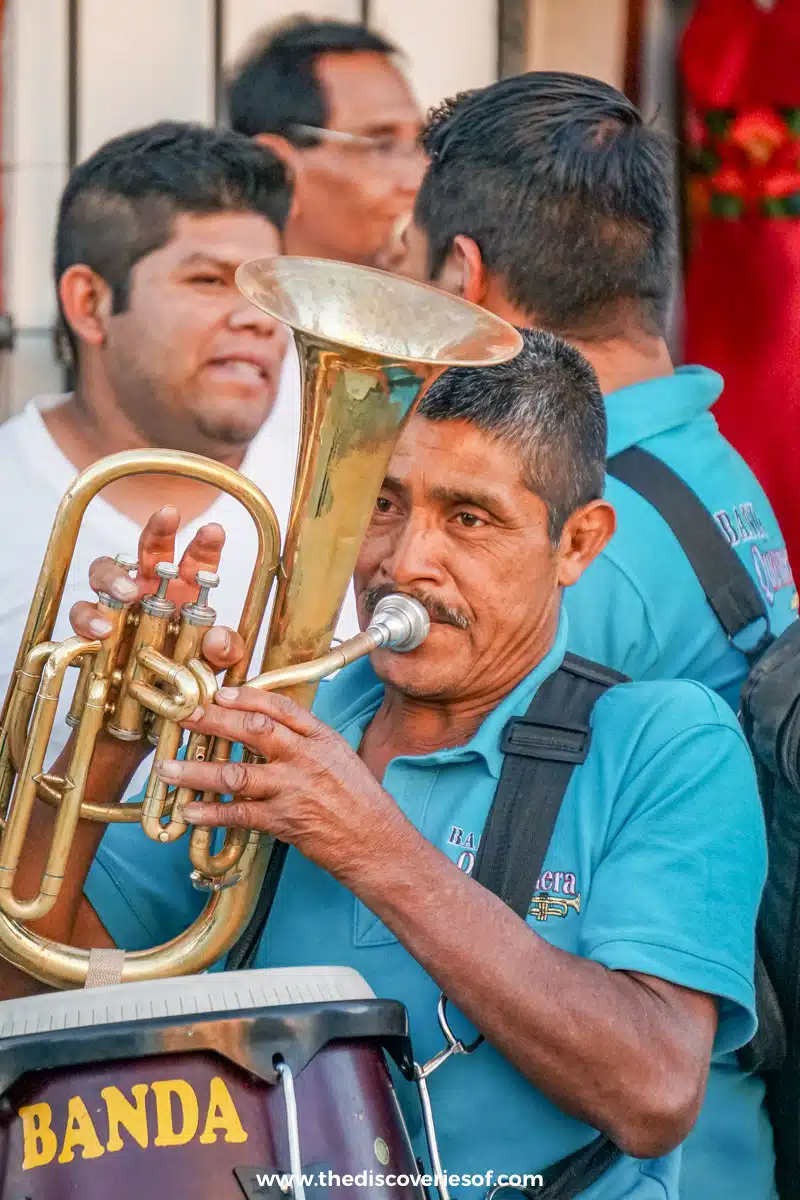 Man playing instrument in local festival