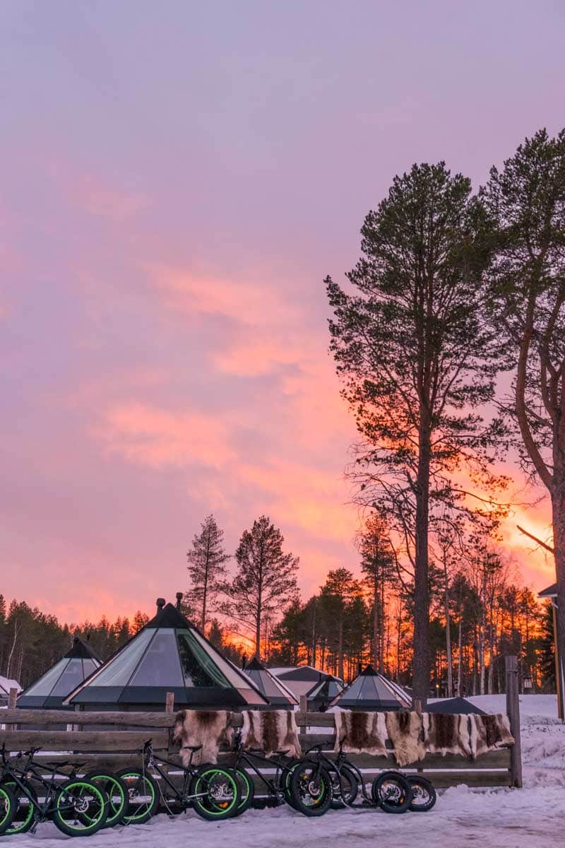 Glass igloos at Apukka at sunset