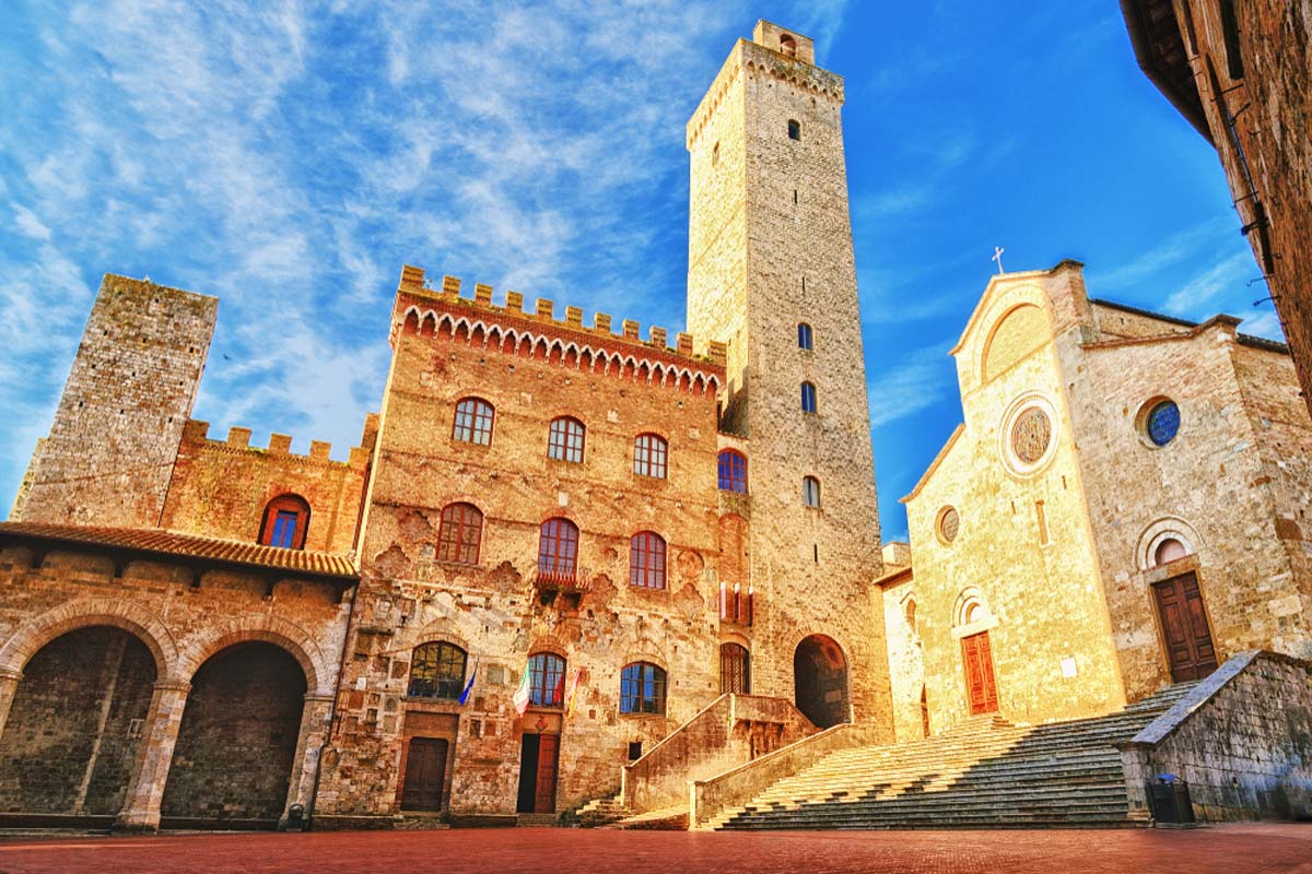 Piazza del Duomo in San Gimignano at sunset, Tuscany, Italy 