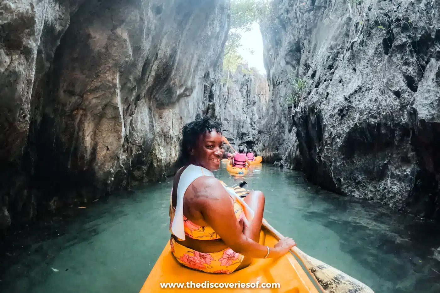 Kayaking through the limestone cliffs