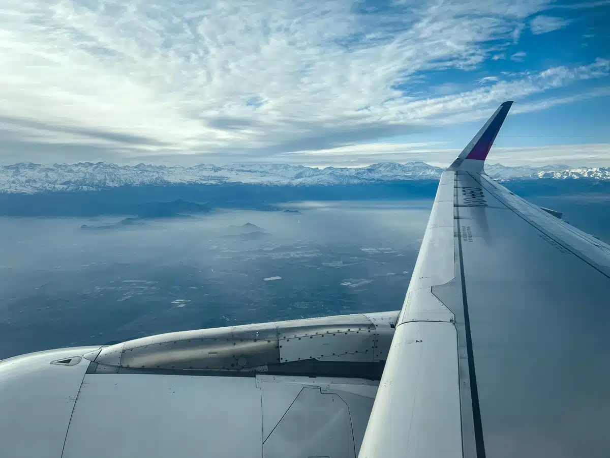 Snow-capped Andes peaks seen from a plane window on the flight into Santiago, Chile