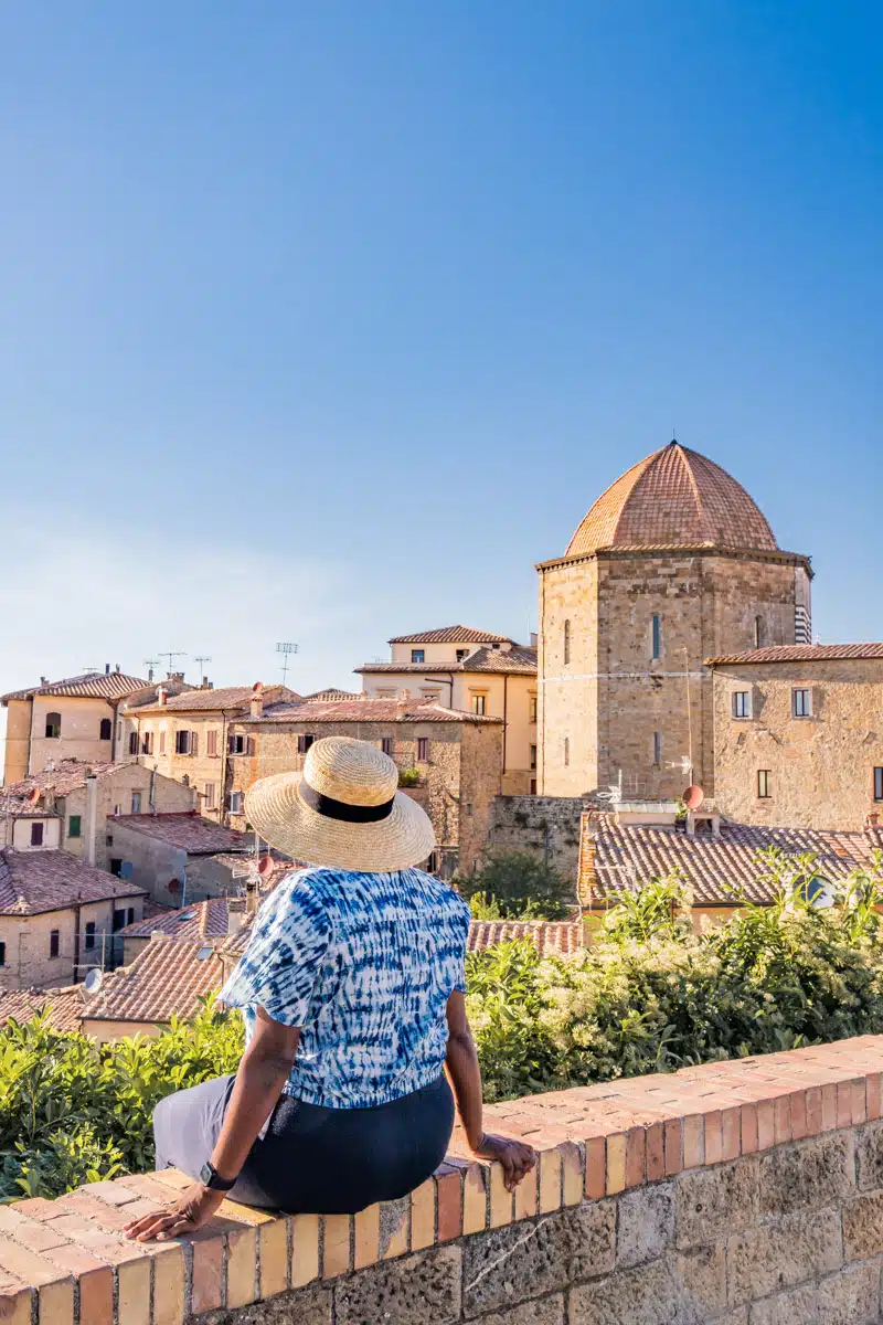 Sitting on the walls in Volterra