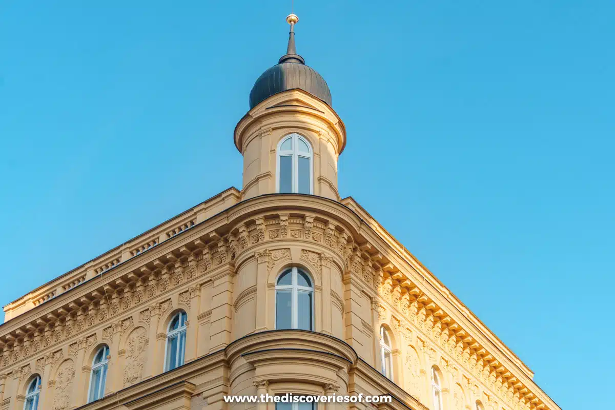 Unique yellow building against a blue sky in Prague
