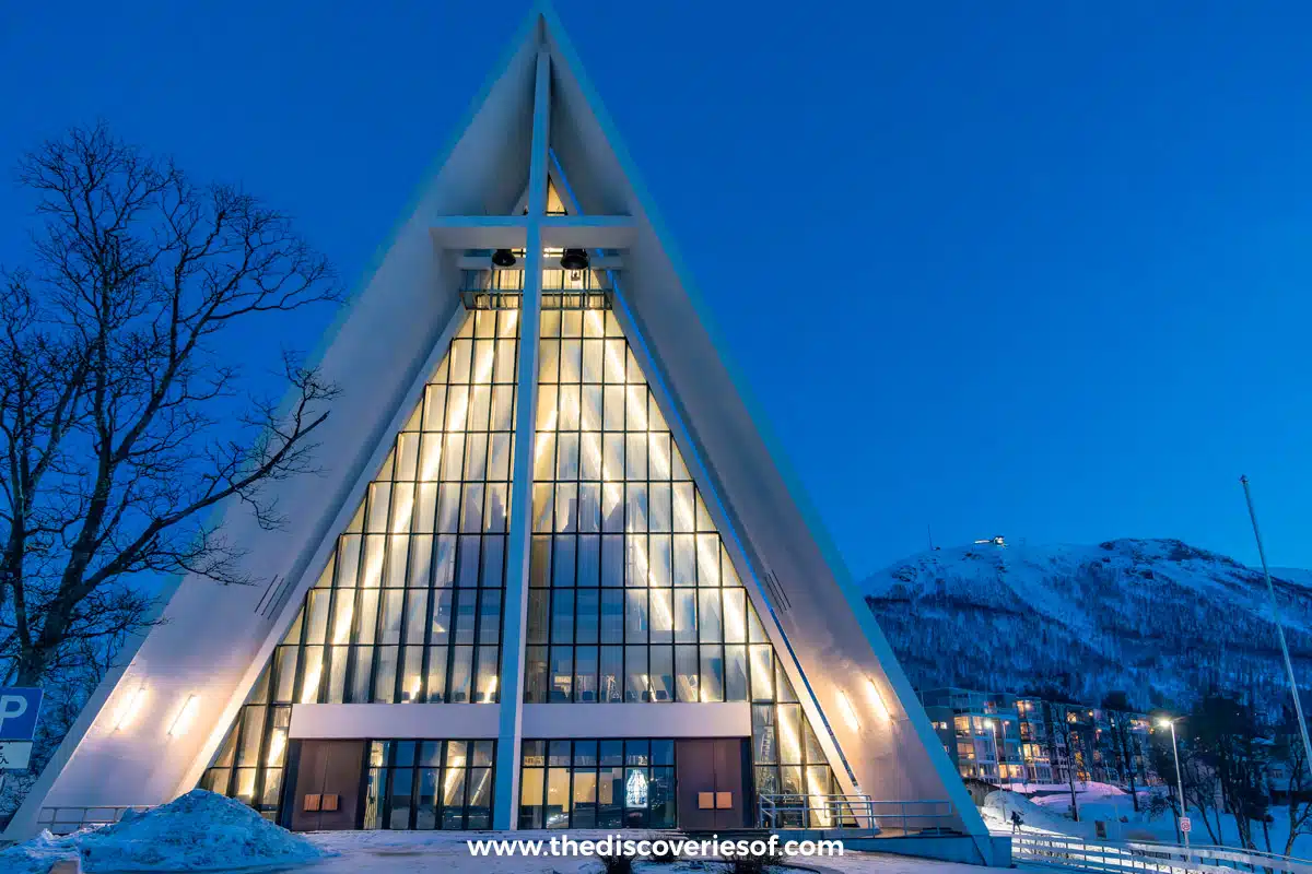 The Arctic Cathedral lit up in the blue hour, just after it closed