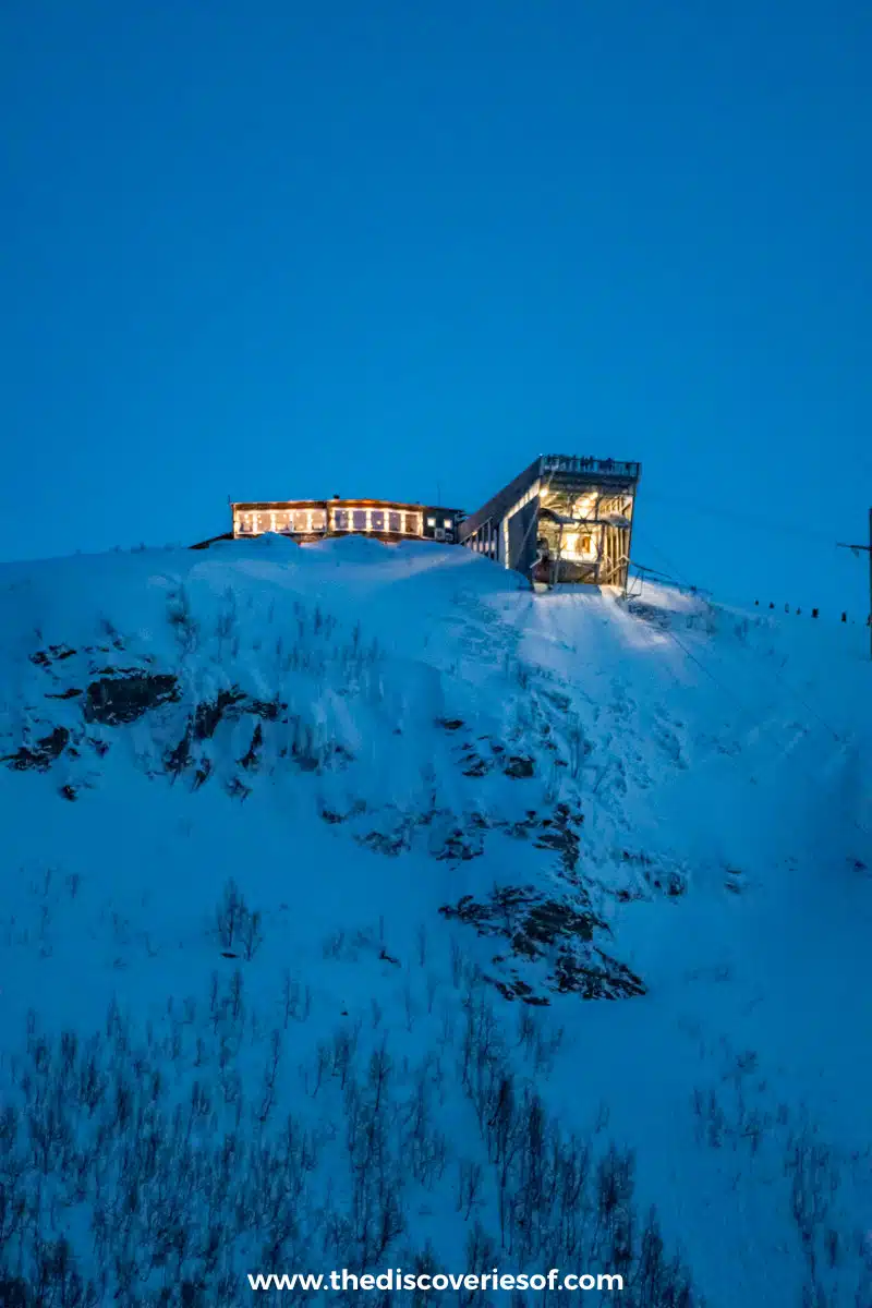 The upper station lit up at dusk