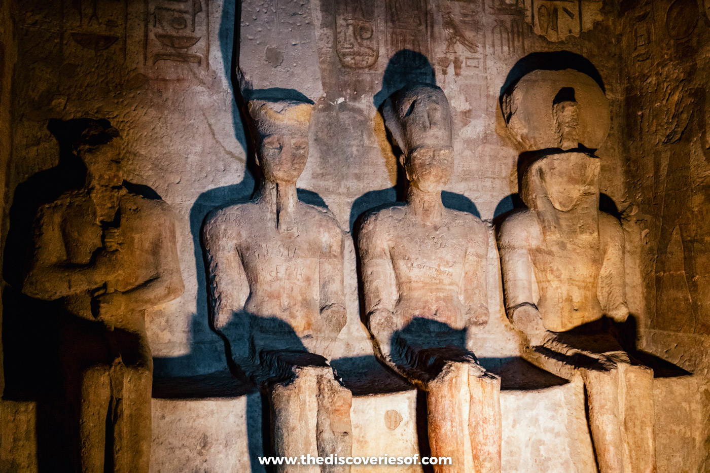 The four seated statues of Ptah, Amun-Ra, Ramses II and Ra-Horakhty in the lit sanctuary, Abu Simbel