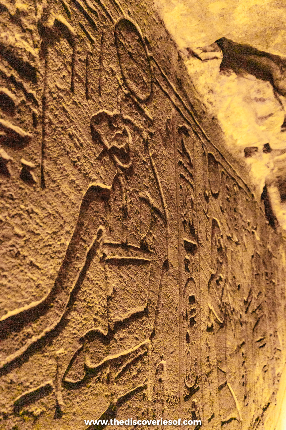 Large sunk relief of a seated god crowned with a sun disc, lit from the side, Great Temple, Abu Simbel