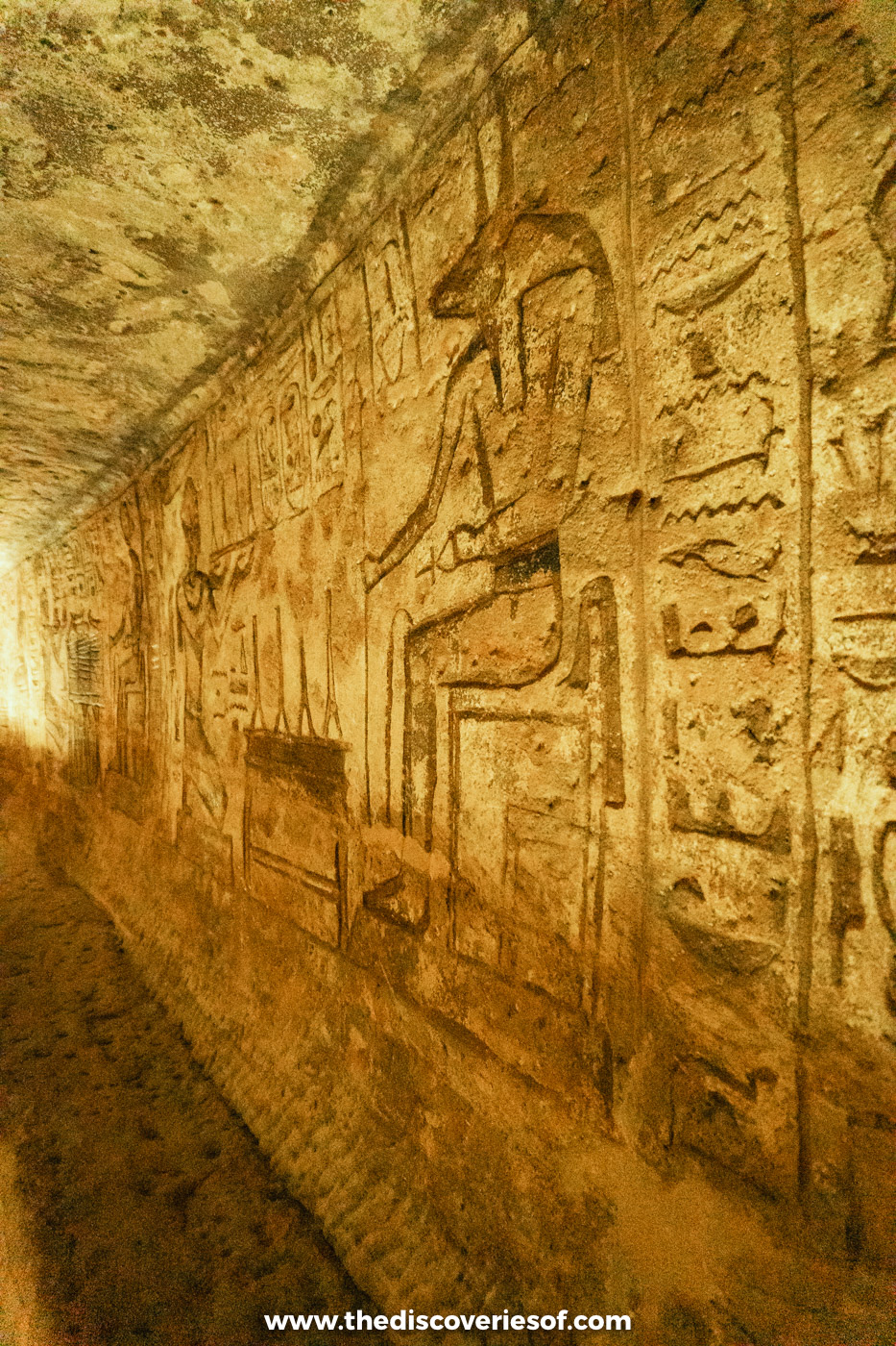 A long, narrow side room of the Great Temple at Abu Simbel, its walls carved with gods and offering scenes