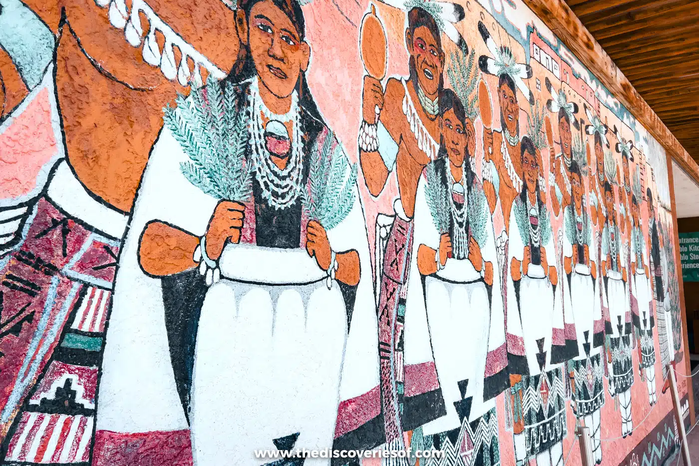 A long painted mural of Pueblo women in traditional dress at the Indian Pueblo Cultural Center, Albuquerque