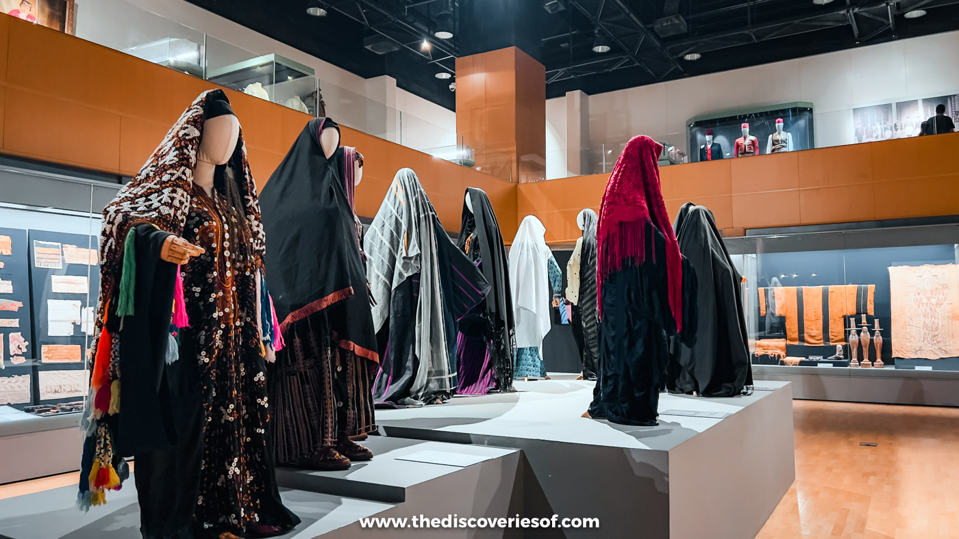 Traditional Egyptian dresses and robes on mannequins in the textiles gallery of the National Museum of Egyptian Civilisation