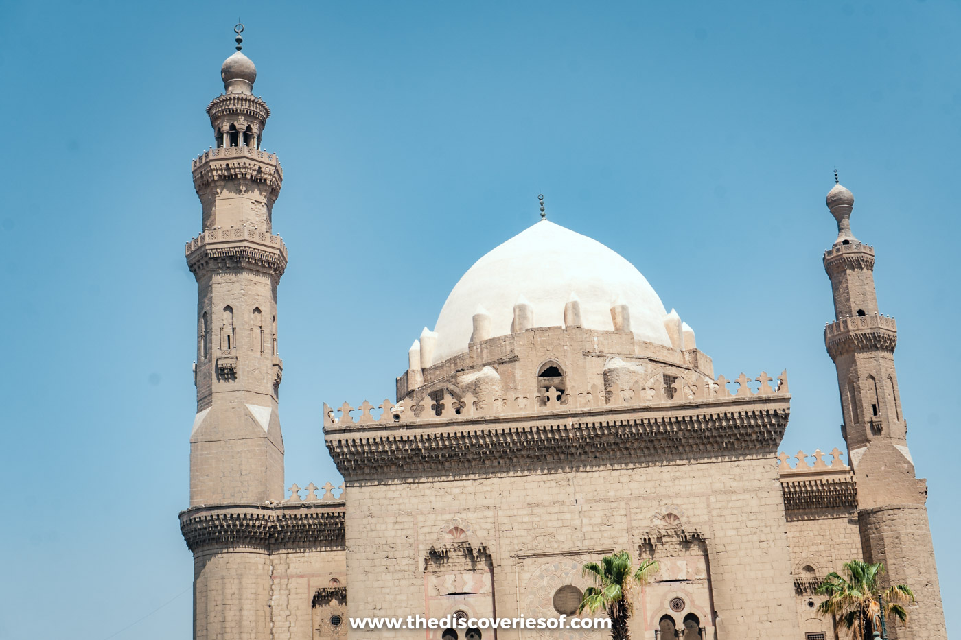 The dome and minarets of the Mosque-Madrasa of Sultan Hassan seen from Salah al-Din Square in Cairo
