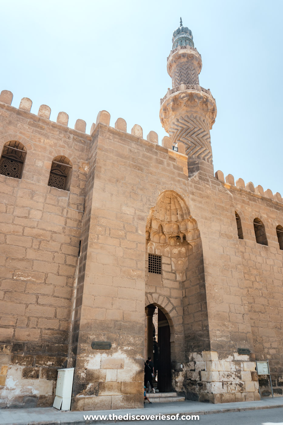 The crenellated stone walls and minaret of the Mosque of al-Nasir Muhammad at the Cairo Citadel