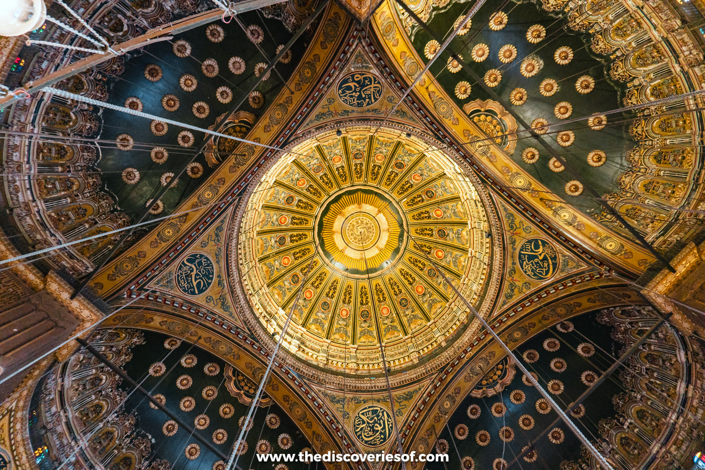 The painted and gilded central dome and half-domes inside the Mosque of Muhammad Ali at the Cairo Citadel