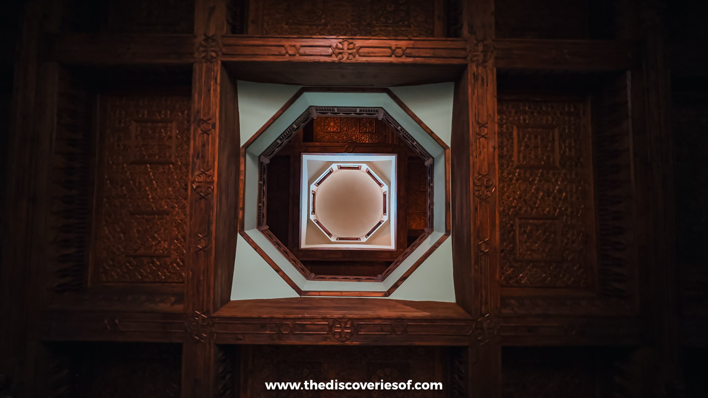 An ornate carved and painted wooden ceiling with an octagonal centre in the Coptic Museum in Cairo