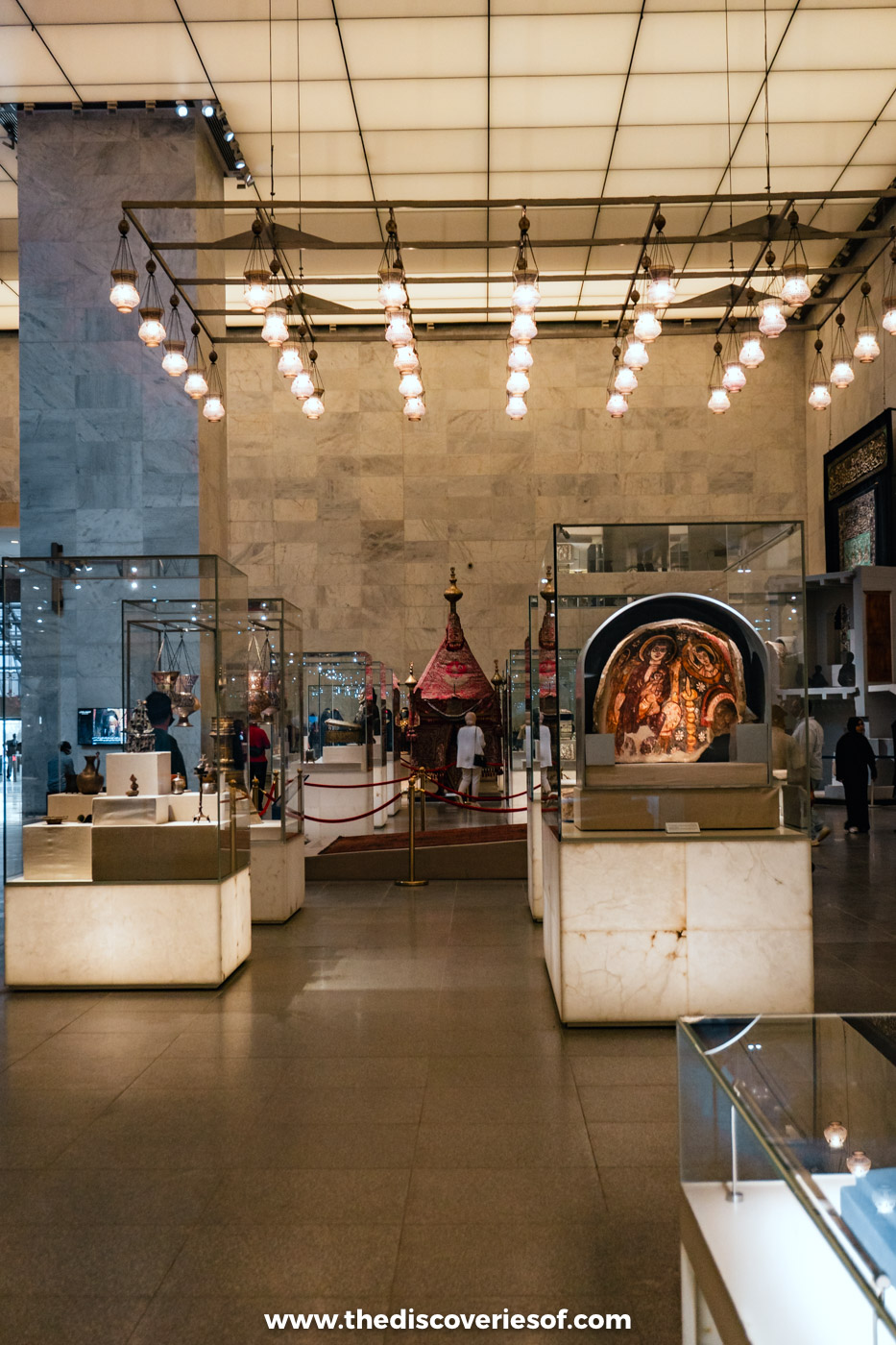 A bright gallery of display cases in the National Museum of Egyptian Civilisation in Cairo