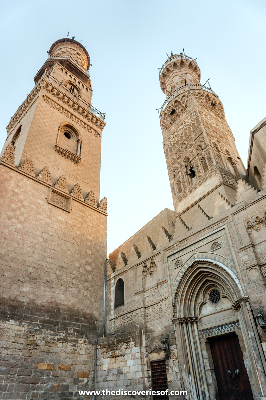 Mamluk minarets and the Gothic doorway of the madrasa of al-Nasir Muhammad on Al-Muizz Street in Islamic Cairo