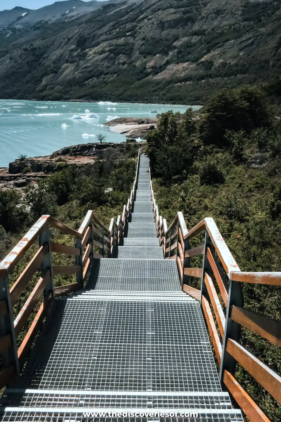 Metal boardwalk staircase leading down towards Lago Argentino at the Perito Moreno Glacier, Argentina