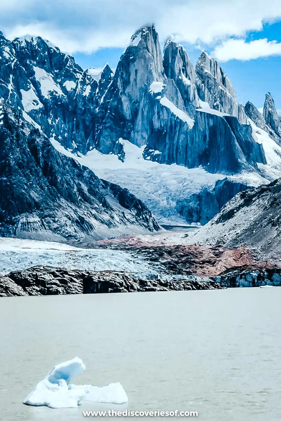 Cerro Torre's granite spires above the glacier and Laguna Torre with floating ice, El Chaltén
