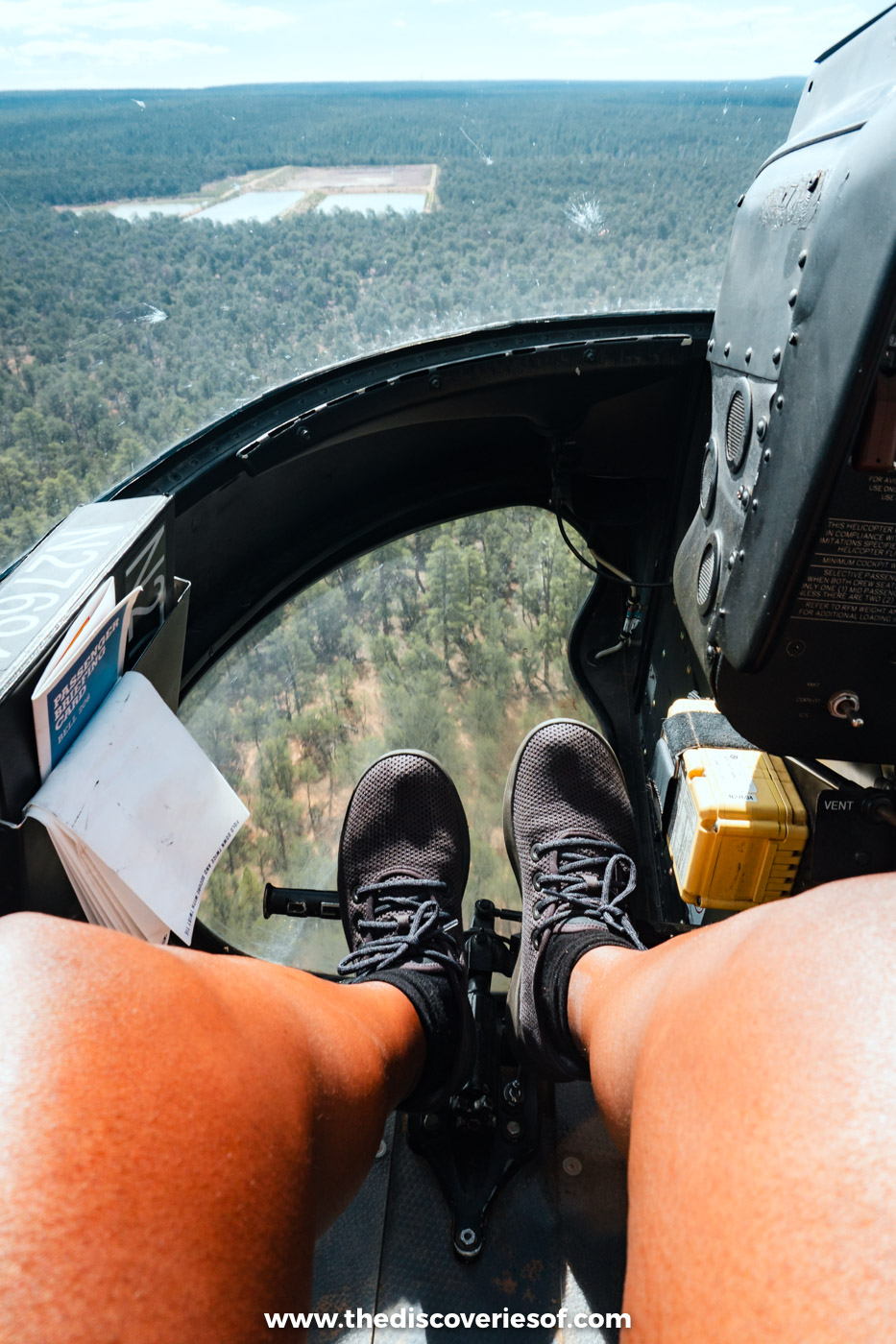 View from the front seat of a Papillon helicopter taking off over the Kaibab National Forest near the Grand Canyon