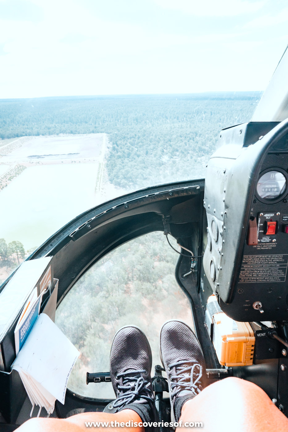 The glass front of a Papillon helicopter over the Grand Canyon