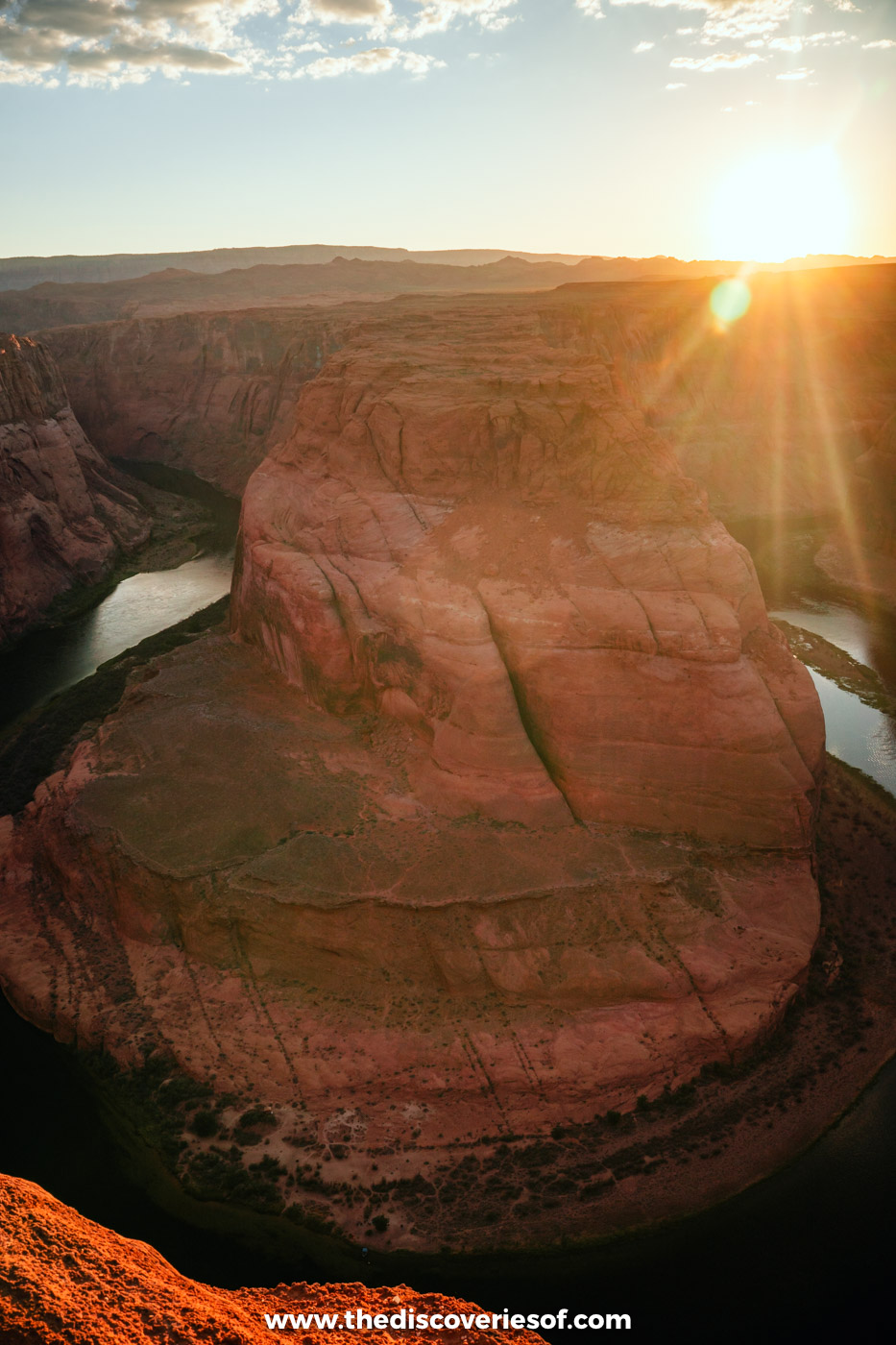 The sun setting over Horseshoe Bend from the overlook near Page