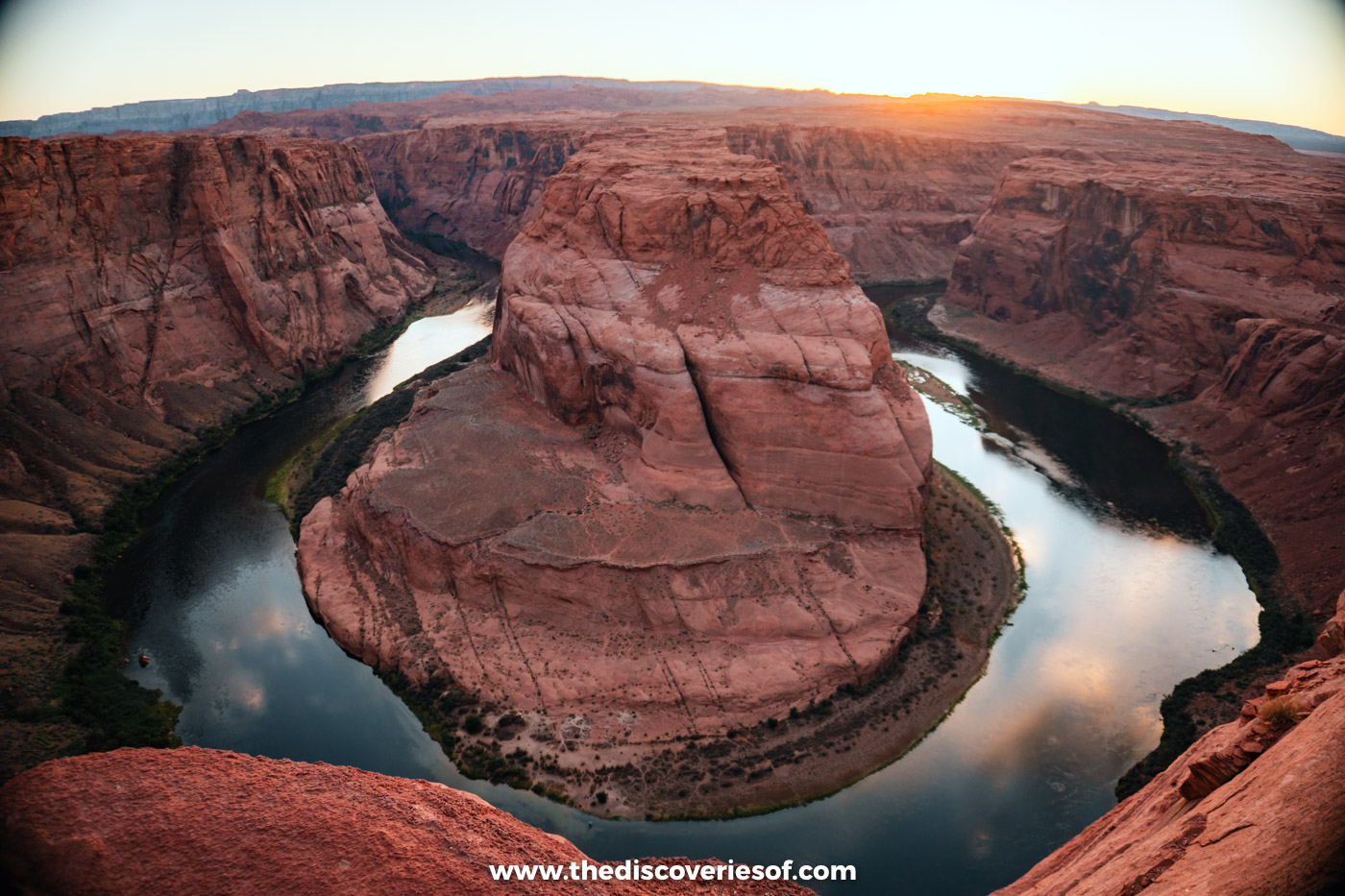 The Colorado River curving round Horseshoe Bend in the afternoon light