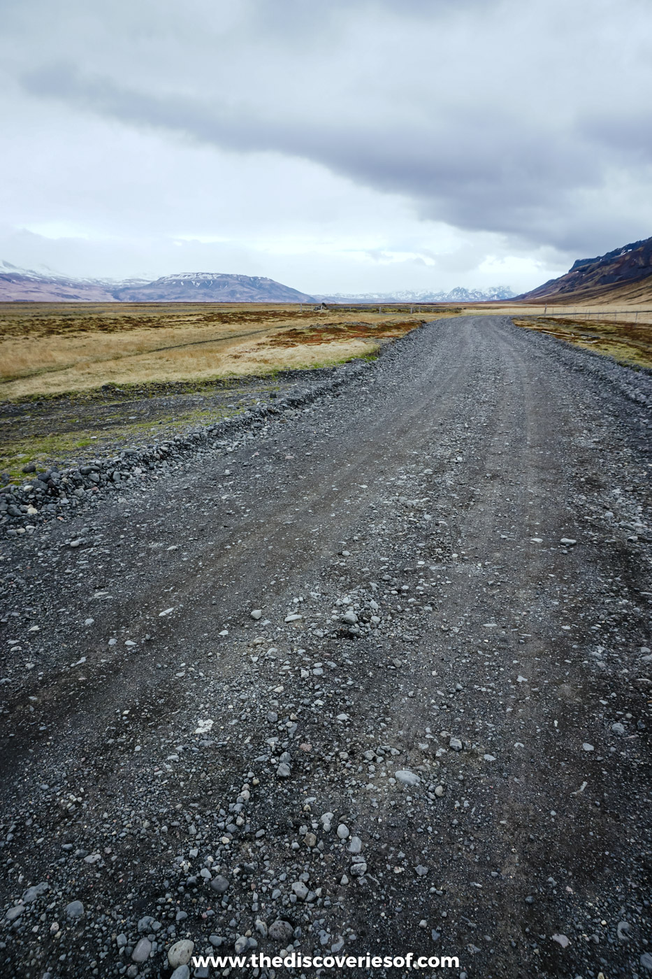 A gravel track running across open moorland towards distant hills on the super jeep route towards Þórsmörk in May