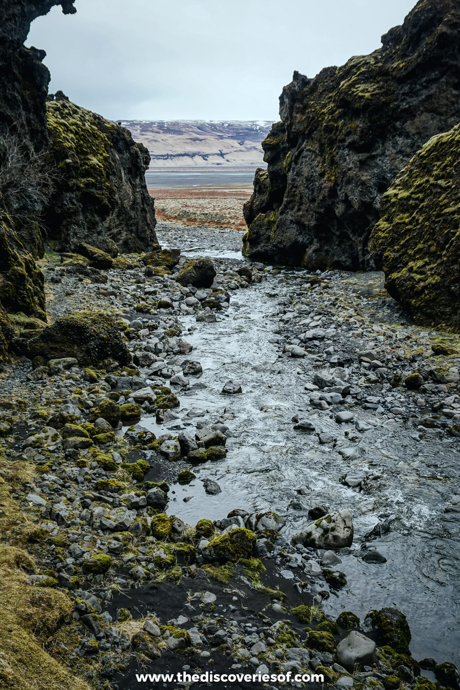 Shallow stream running through a mossy rock gorge on the super jeep route into Þórsmörk