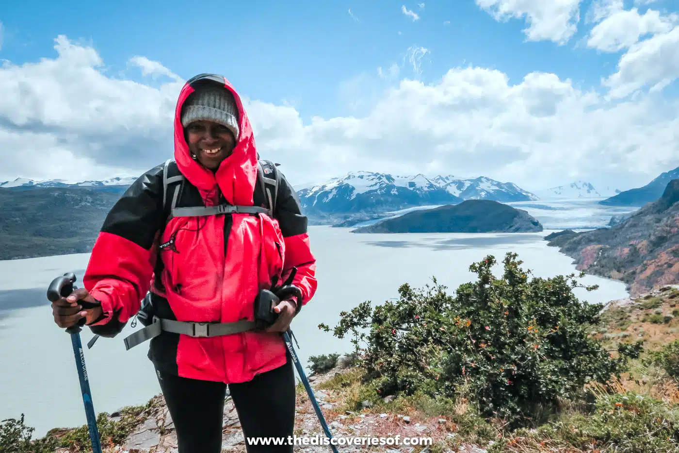 Julianna Barnaby with hiking poles above Lago Grey on the W Trek, Torres del Paine, Chile