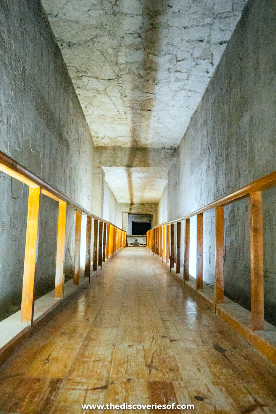 Long plain corridor with a wooden walkway and handrails in the extension of tomb KV14, Valley of the Kings