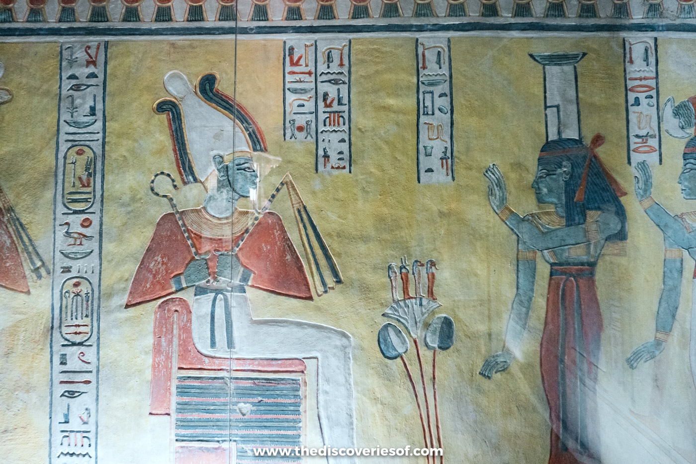 Painted scene of Osiris seated on a throne with a goddess raising her hands in tomb QV44, Luxor