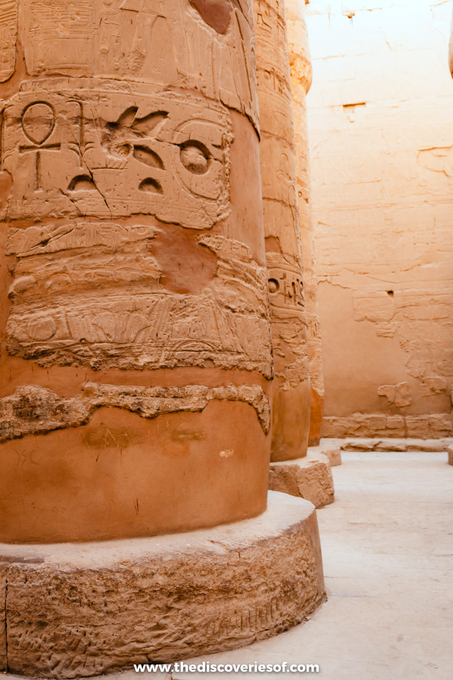 Massive carved sandstone columns of the Great Hypostyle Hall at Karnak Temple, Luxor