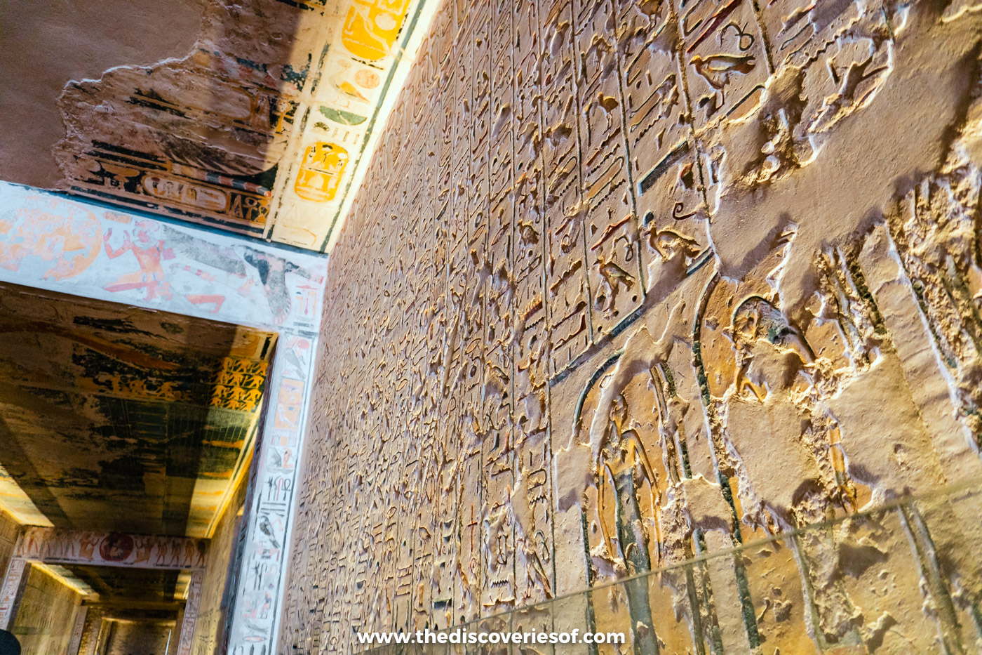 Sunk relief wall and the painted doorway of a side chamber in the first corridor of tomb KV6, Luxor
