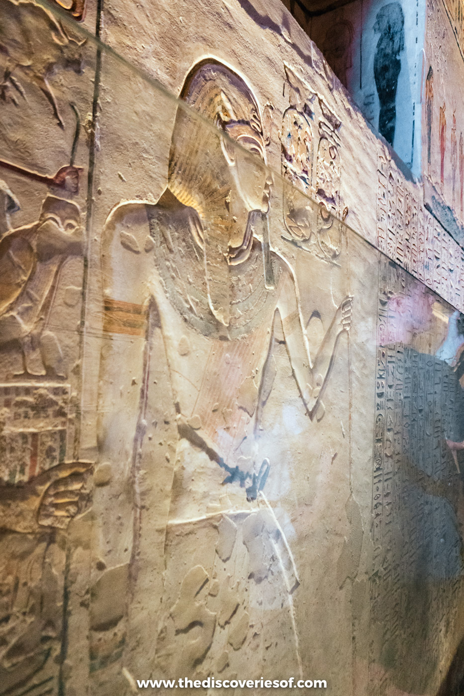 Raised relief of Ramses IX behind glass in the first corridor of his tomb KV6, Valley of the Kings