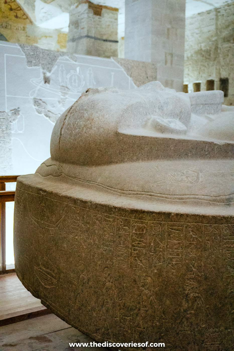 Red granite sarcophagus lid carved with Merenptah's effigy above an inscribed box in tomb KV8, Luxor