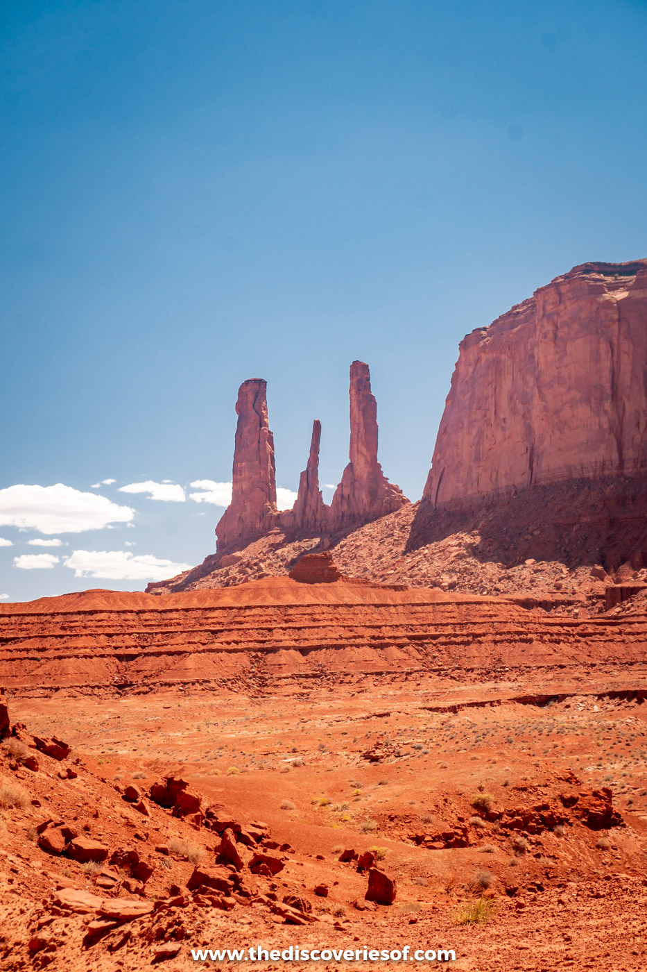 The slender Three Sisters spires at the end of Mitchell Mesa in Monument Valley
